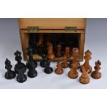 A 19th century boxwood and ebonised Staunton pattern chess set, weighted bases, the Kings 9.