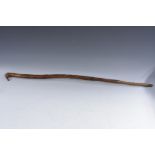 Folk Art - a 19th century fruitwood walking stick, carved overall with a verse and dated 1841,