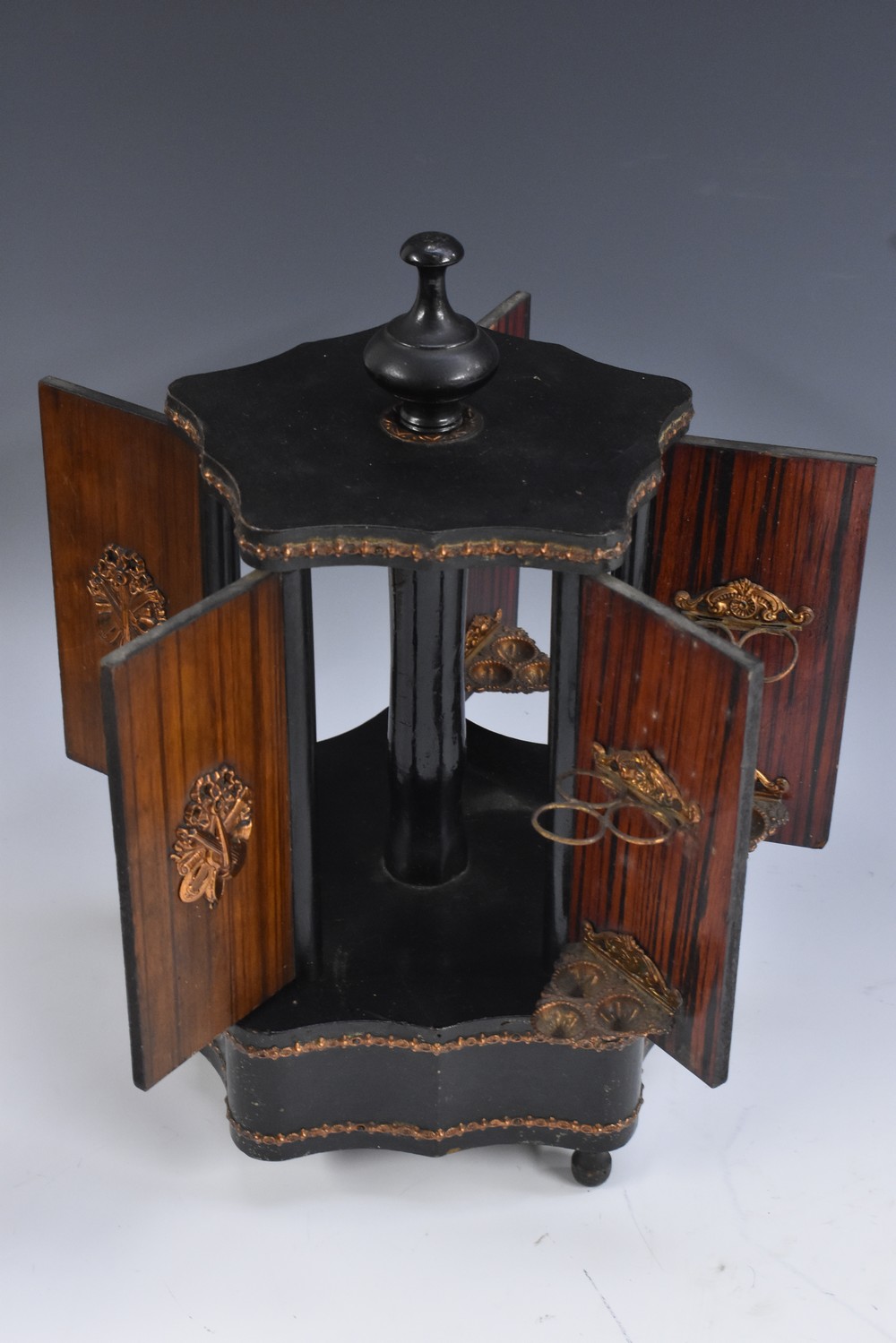 A 19th century French gilt metal mounted walnut and ebonised cigar cabinet,