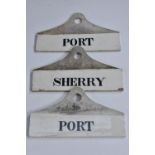 A set of three late 19th century wine cellar bin labels, inscribed Port and Sherry, 14cm wide, c.