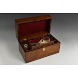 A Victorian mahogany apothecary box, hinged cover enclosing an arrangement of compartments,