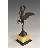 A 19th century dark patinated bronze pocket watch stand, as a stork on the back of a tortoise,
