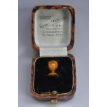 A 19th century amber miniature goblet, 1.