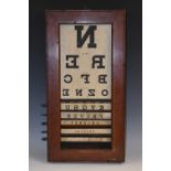 Medical - an early 20th century mahogany optician's examination board,