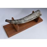 A cattle horn powder flask, later carved in the American Folk Art manner and inscribed Pte.