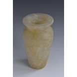 An Egyptian alabaster ovoid vase,