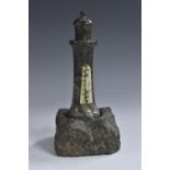 An early 20th century Cornish serpentine novelty desk thermometer, as a lighthouse, ivorine scale,