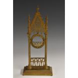 A 19th century Gothic Revival gilt metal pocket watch stand, pierced with tracery, rectangular base,