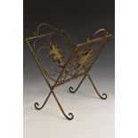 A French patinated bronze folding periodical rack, each panel centred by acanthus,