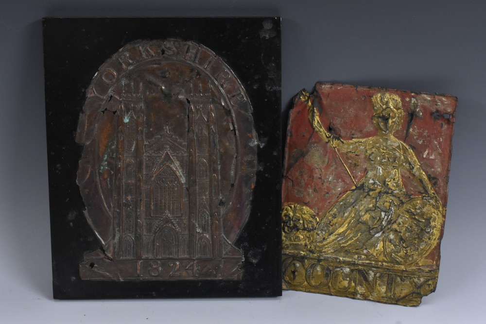 A 19th century copper fire mark, Yorkshire, embossed with the elevation of York Minster,