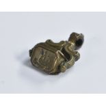 A 19th century brass triform swivel fob seal, the intaglio matrices as a ship,