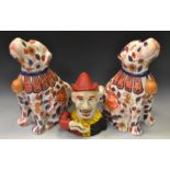 A pair of Oriental style Imari Dogs of Fo; a reproduction cast metal money box cast as a jester.