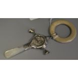 A George V silver baby's rattle,