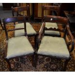 Three Regency mahogany dining chairs, scrolling uprights, rope twist horizontal splat, drop in seat,