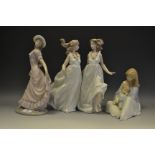 A Lladro group, flower girls (purchased 1996 from Disney World $795); a Nao figure,