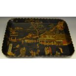 A Papier Mache tray decorated with pagodas and figures.