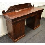 A Victorian flame mahogany twin pedestal sideboard, shaped gallery, single drawer to frieze,