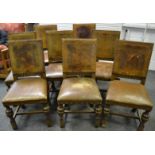 A set of eight oak dining chairs, embossed leather backs, padded seat, cup and cover forelegs.
