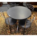 An Italian black marble cafe table and four conforming chairs,
