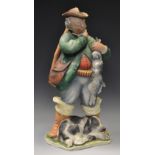 A Capodimonte figure of a huntsman, holding a rabbit, with his dog, 27cm high,