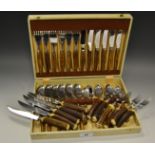 A Canteen of wooden hafted cutlery for six;