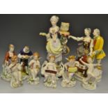 Continental ceramics - a set of Italian porcelain cherubs playing musical instruments;