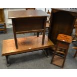 A copper covered coffee table; an oak work box; a jardiniere stand; an oak bookcase.