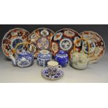 Oriental - a pair of Japanese Imari plates; another; a Chinese blue & white ginger jar;