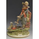 A Capo-di-Monte figure by Scuttore Tiziaho,