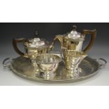 A 5 piece silver plated tea service comprising tray, tea pot, hot water jug,