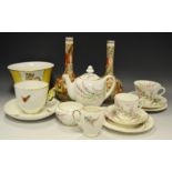 A Royal Doulton breakfast set pattern H1840 comprising teapot, cups and saucers, creamier,