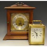 A Metamec 8 day mahogany mantel clock;