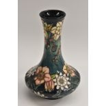 A contemporary Moorcroft Passion Fruit pattern vase, designed by Rachel Bishop,
