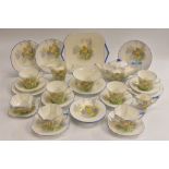 A Shelley Daffodil pattern Queen Anne shape tea for two, comprising teapot, milk jug, sugar bowl,