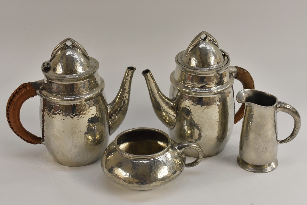 A Liberty & Co Tudric pewter coffee service, after a design by Archibald Knox,