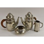 A Liberty & Co Tudric pewter coffee service, after a design by Archibald Knox,