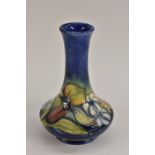 A Moorcroft Orchid pattern vase,