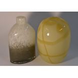 A 20th century Studio Glass ovoid vase, in mottled yellow, 21cm high,; another, flat bottle shape,