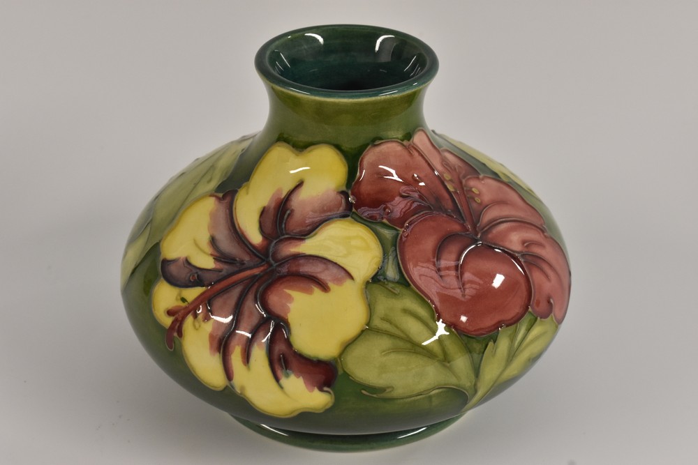 A Moorcroft Hibiscus pattern compressed ovoid vase,