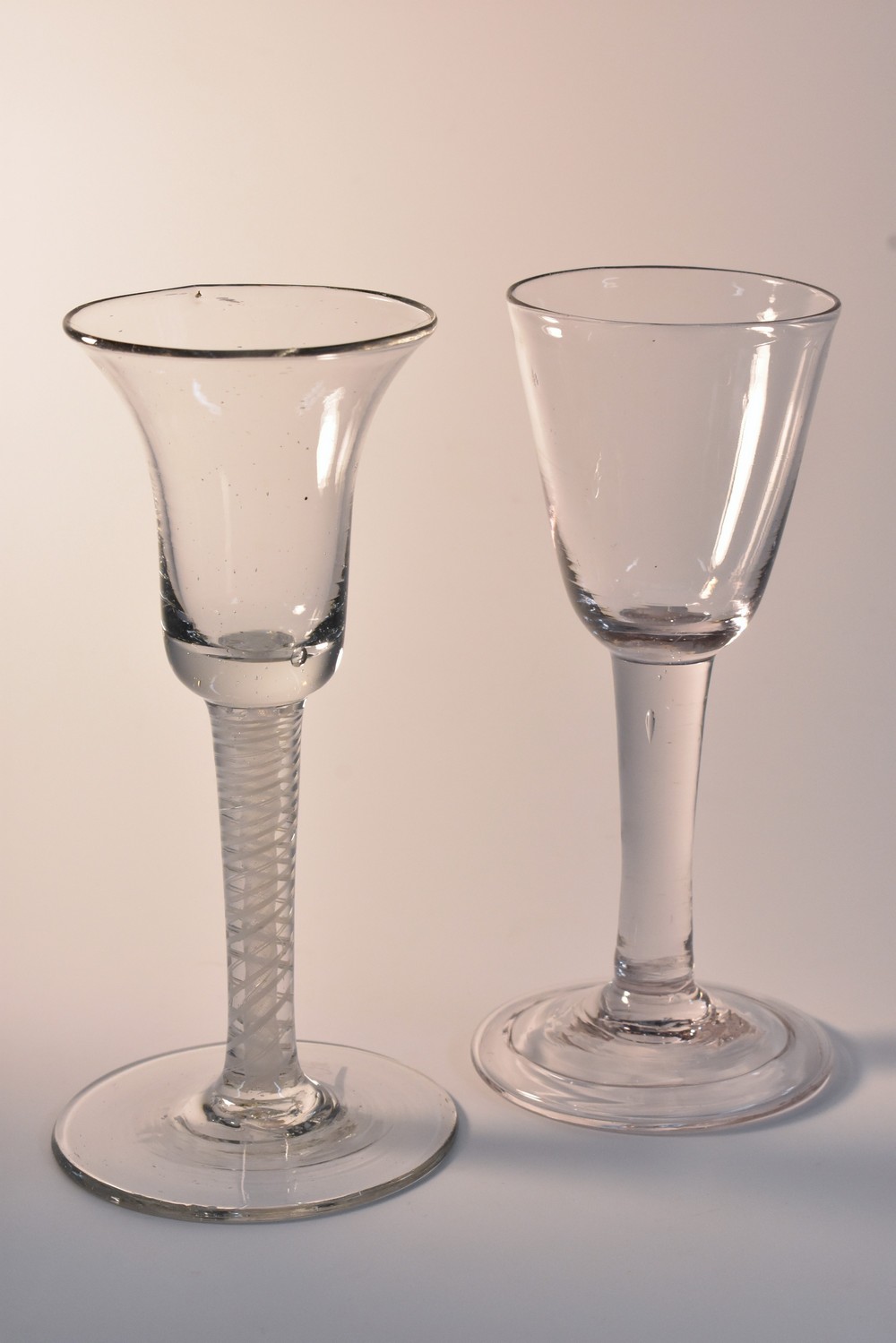 An opaque air twist drinking glass; a 19th century glass,