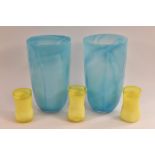 A set of three French Les Verriers de Maure Vieil opaque yellow glass waisted cylindrical vases,