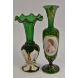 A late 19th century Bohemian emerald glass pedestal slender ovoid vase,