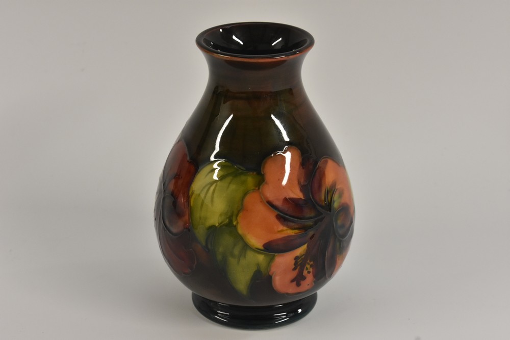 A Moorcroft Hibiscus pattern baluster vase,