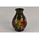 A Moorcroft Hibiscus pattern baluster vase,