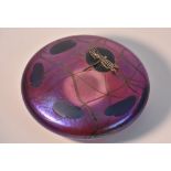 A John Ditchfield Glasform Dragonfly pebble paperweight, the white in lilac and purple with lilies,