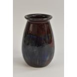 A Bernard Moore early experimental drip glazed ovoid vase in shades of cobalt blue and sea green on