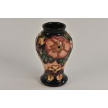 A Moorcroft Honeysuckle pattern vase,