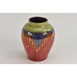 A Bernard Moore ovoid miniature vase, lustre glazed in shades of apple green, cobalt blue,