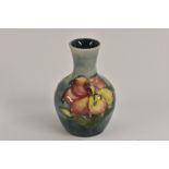 A Moorcroft African Lily pattern miniature vase,