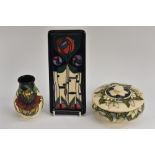 A contemporary Moorcroft Arum Lily pattern ovoid vase, tube lined with stylised flowers, 10cm high,